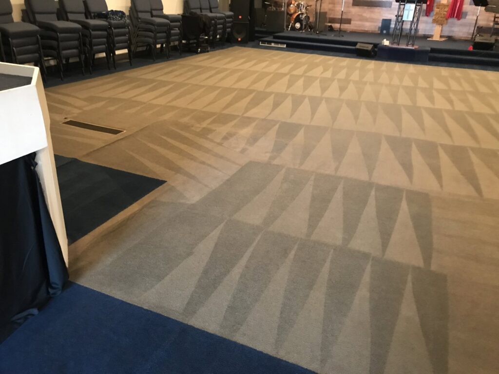 Professional cleaning lines visible on a large commercial carpet by Monarch Cleaning Solutions in Parkville, MO