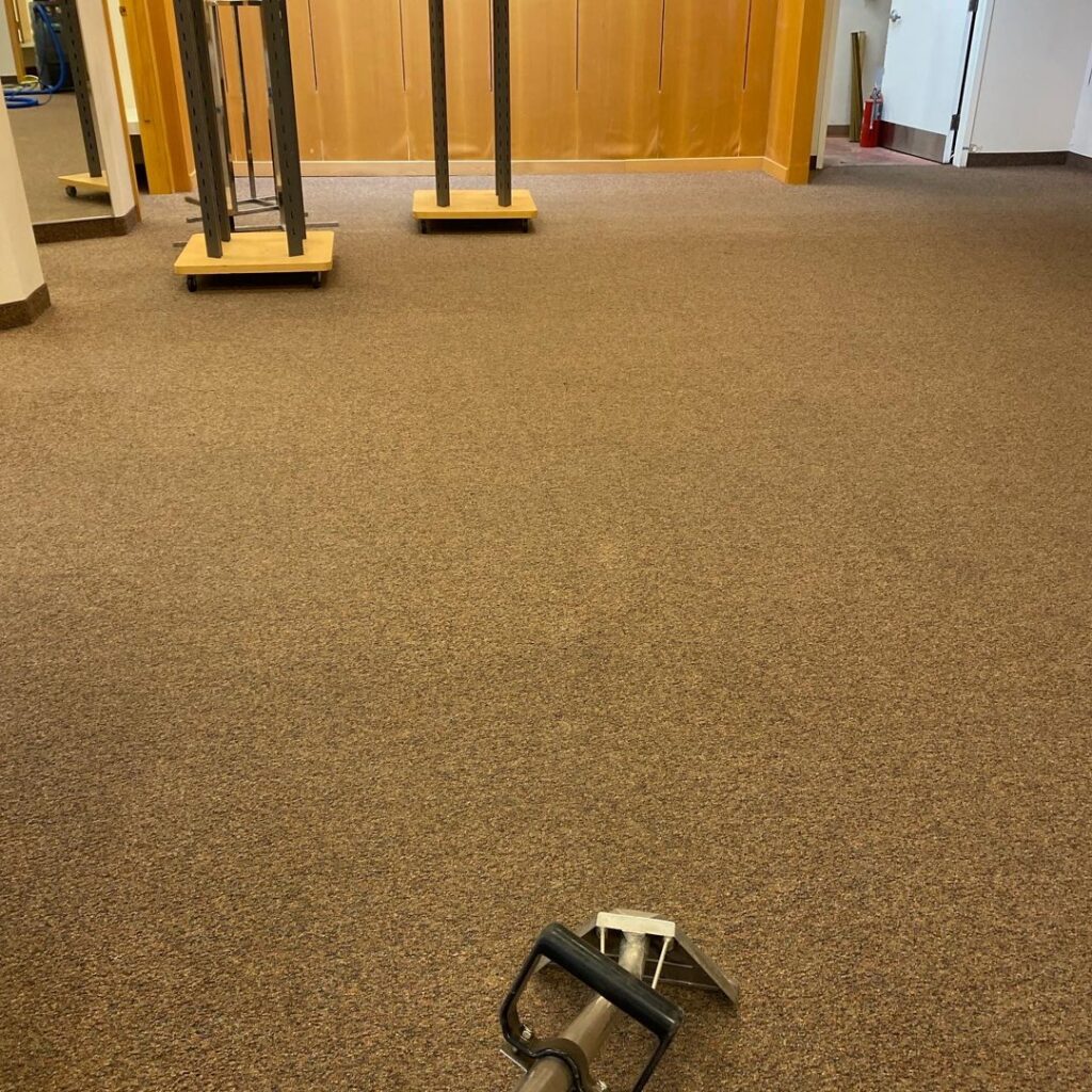 A professional carpet cleaning service in a commercial setting by The Floor Care Guys in Bentonville, AR.