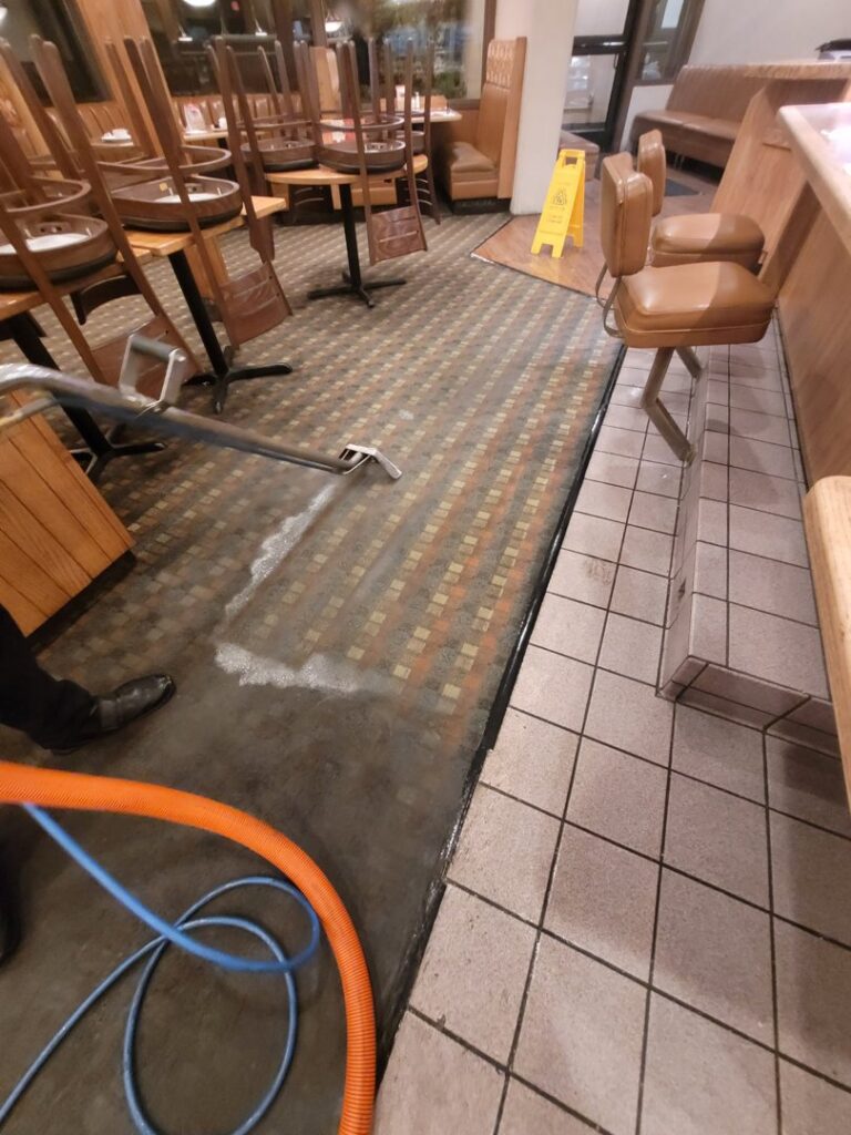 Commercial carpet cleaning with visible suds and wand by PDX STAR in Happy Valley, OR
