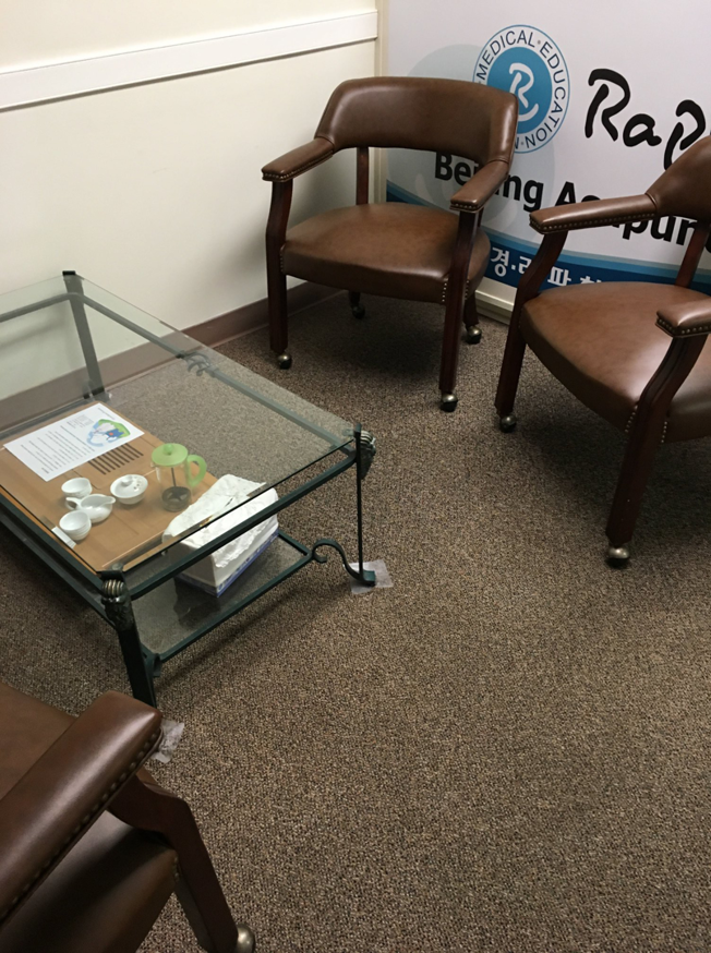 Commercial brown carpet in a waiting room, showcasing the type of flooring Kamps Carpet Cleaning Inc. services in Richmond, VA.