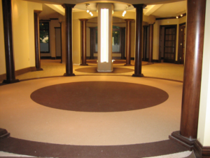Commercial carpet installation with custom circular patterns by Denver Carpet and Hardwood LLC in Denver, CO