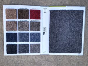 A Shaw commercial carpet sample book showcasing options from New City Carpet And Flooring in Chicago, IL
