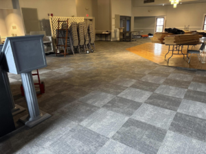 Commercial carpet tile and wood flooring installation in a large event space by Branch Floor Covering in Cranston, RI