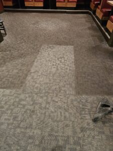 Before and after cleaning of commercial carpet tiles by Andy's Cleaning Company LLC in Topeka, KS.