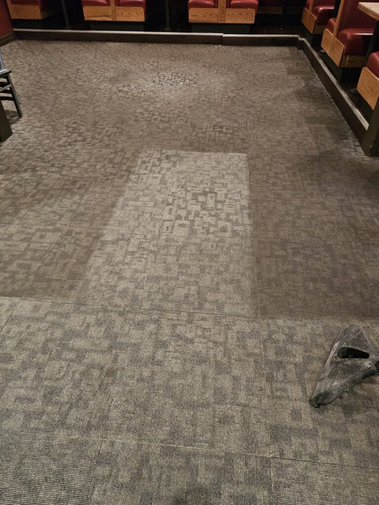 Before and after cleaning of commercial carpet tiles by Andy's Cleaning Company LLC in Topeka, KS.