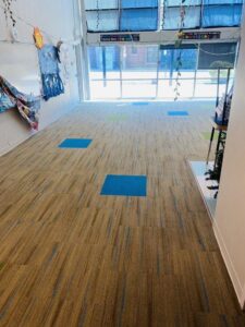 A room with newly installed commercial carpet tile flooring by Anderson Certified, INC. in Chicago, IL.