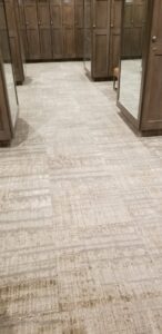 Commercial carpet tile installation in a locker room by Chicago Floor Systems in Chicago, IL