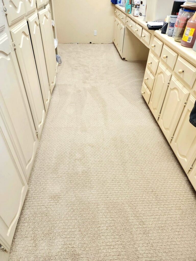 New grey commercial carpet tiles installed in a courtroom, showcasing a completed project by Affordable Carpet & Flooring in Dallas, TX.