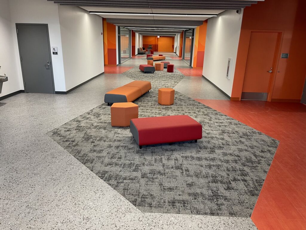 Commercial carpet tile installation in a modern hallway by Flawless Design Flooring LLC in New Lenox, IL