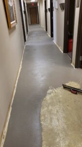 Newly installed commercial carpet tiles in a large office space by NANO Flooring in Baton Rouge, LA