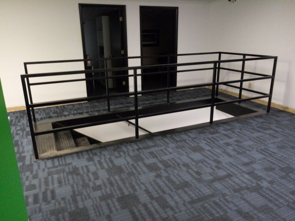 A commercial space with newly installed patterned carpet tiles by Plaza Carpets in Lexington, KY