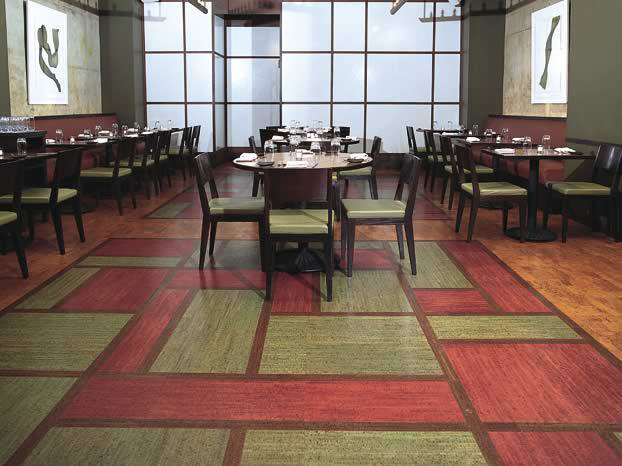 A restaurant dining area with modern commercial carpet tile installation by Tile Medics in Memphis, TN.