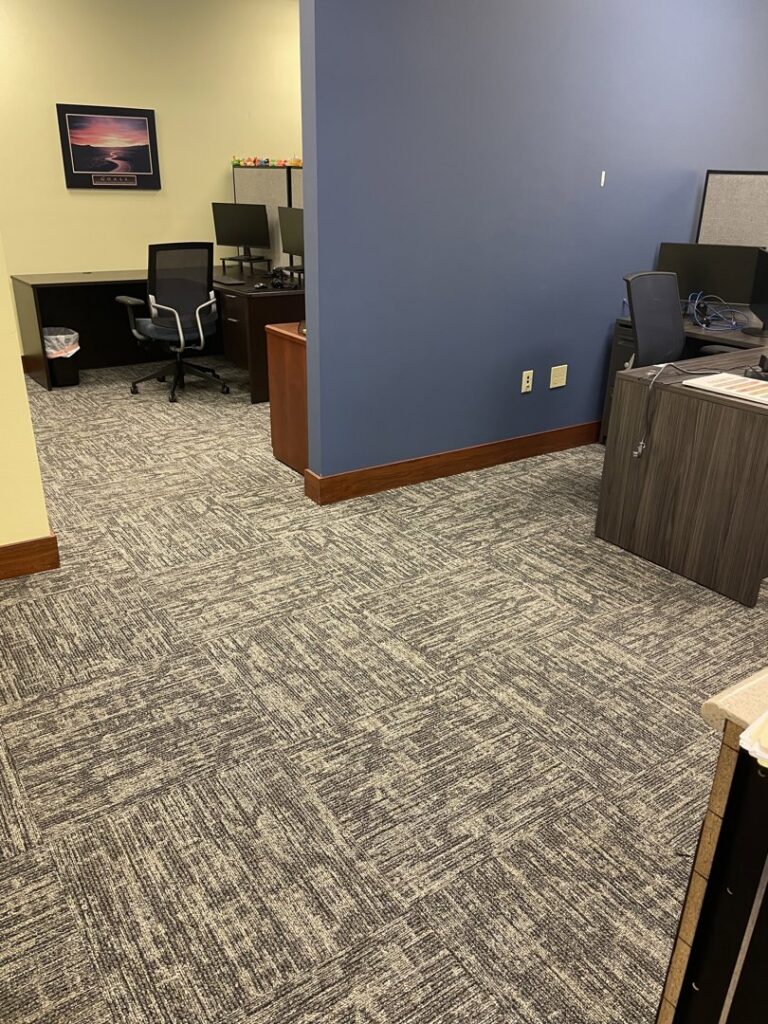 A newly installed commercial carpet tile floor in an office space by Rugratz Flooring in Morgantown, WV.