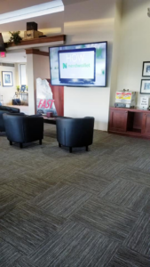 A commercial space featuring newly installed carpet tile flooring by Timeless Flooring in Peoria, AZ