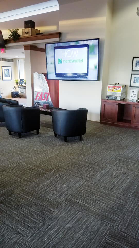 A commercial space featuring newly installed carpet tile flooring by Timeless Flooring in Peoria, AZ