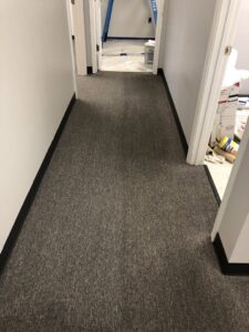 A clean, professionally maintained commercial carpeted hallway by ISteam Carpet Care in Chattanooga, TN.