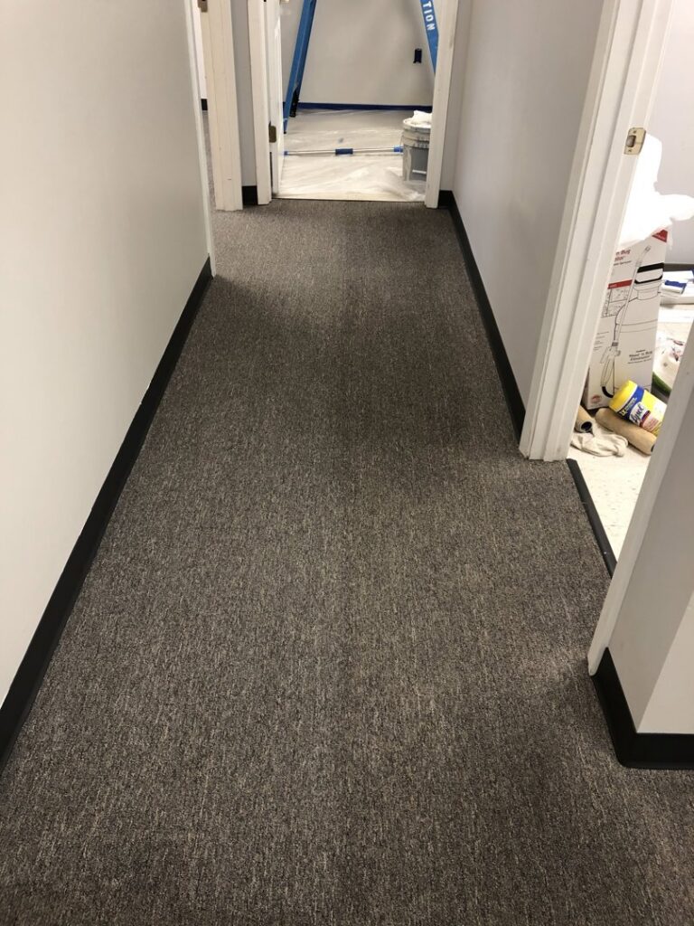 A clean, professionally maintained commercial carpeted hallway by ISteam Carpet Care in Chattanooga, TN.