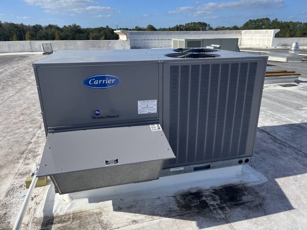 A large commercial Carrier rooftop HVAC unit installed by Timely Air Conditioning in Riverview, FL.