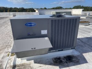 A large commercial Carrier rooftop HVAC unit installed by Timely Air Conditioning in Riverview, FL.