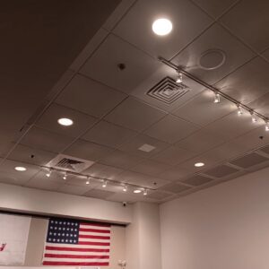 A commercial ceiling with newly installed recessed and track lighting by Ride the Lightning Electrical Services in El Cajon, CA.