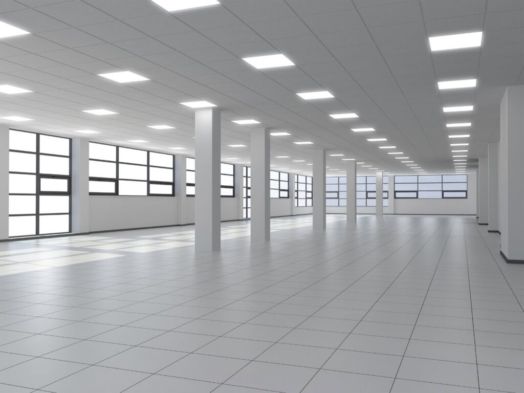 A large commercial space with numerous square ceiling lights, installed by Vitality Electric in Sacramento, CA.