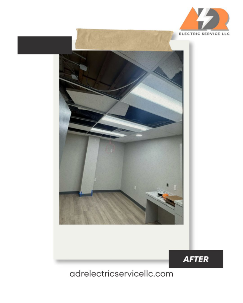 Commercial ceiling with grid tiles removed, showing new lighting fixtures and wiring installed by ADR Electric in Indianapolis, IN.