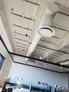Exposed electrical conduit and wiring on a commercial ceiling, part of an installation by KS Retail Solutions in Victoria, TX