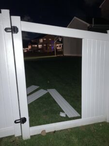 Commercial chain-link fence with a large gate installed by Pro-Soil Site Services, Inc in Lansing, MI