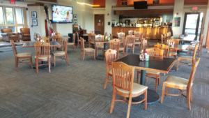 A commercial dining room featuring durable carpet tile flooring installed by Timeless Flooring in Peoria, AZ