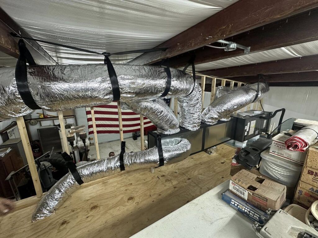 Commercial ductwork installation suspended from the ceiling, completed by Grand Slam Heating & Air in Baton Rouge, LA.