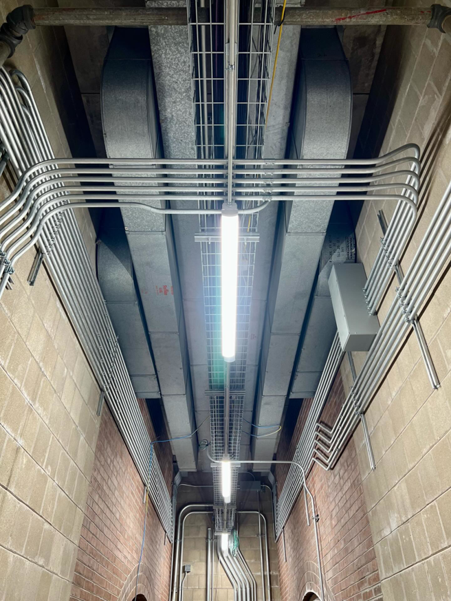 Overhead view of commercial electrical conduit and lighting installation completed by Votaw Electric in Fort Wayne, IN