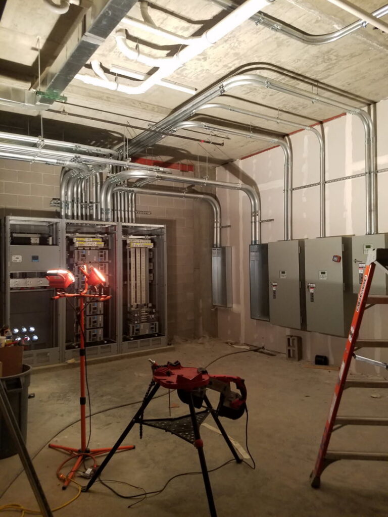 Extensive electrical conduit and panels installed in a commercial building by Bottom To The Top Electric LLC in Lakewood, CO.