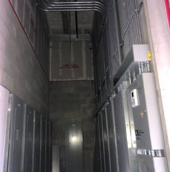 Commercial electrical conduit runs installed on the ceiling of a building by Tri-Area Electrical Construction in Cape Coral, FL.