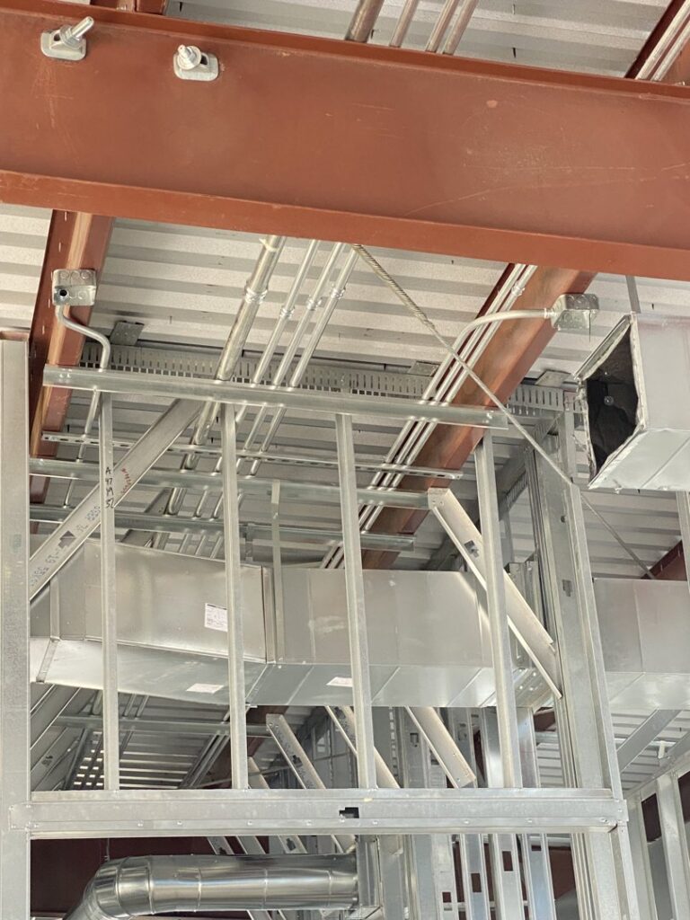 Commercial electrical conduit and wiring installation in progress by Ross Electric Company in Arlington, TN.