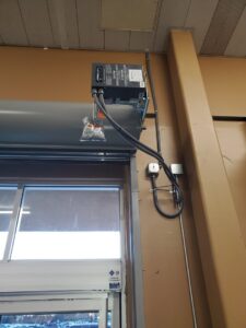 A commercial electrical control box with conduit and wiring installed by Tim Lambert Electric in Fayetteville, NC.