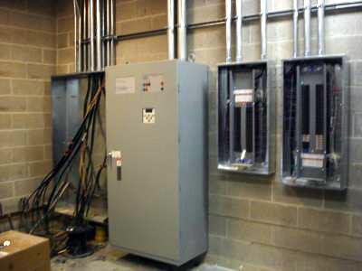 A large commercial electrical control panel with conduits and wiring, installed by Electric Experts Inc in Caldwell, ID.