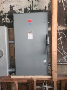 A large commercial electrical disconnect switch installed by TOTAL Electric LLC in Fayetteville, NC.