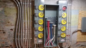 A commercial electrical meter bank installation with conduit and wiring by Gurley Electric LLC in Churchville, MD