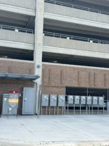 Commercial electrical meter and distribution panels installed on the exterior of a building by Wired Inc. in Lincoln, NE.