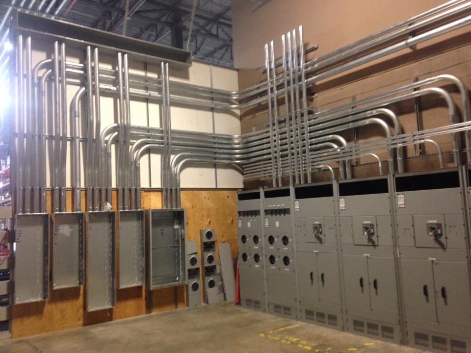 Large commercial electrical panel and conduit installation by Richard Sullivan Licensed Electrician in Brockton, MA.