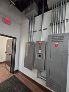 Newly installed commercial electrical panels and conduit by Acevedo's Electric in Dallas, TX.