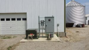 An outdoor commercial electrical panel and transformer installed by All Circuit Electrical LLC at a facility in Bryant, IN.