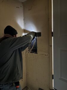 Multiple electrical panels and meter installed on the exterior of a commercial building by Top notch electric llc in Clearwater, FL.