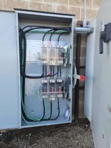 Interior view of a commercial electrical panel with organized wiring by B&C Electric LLC in Bakersfield, CA