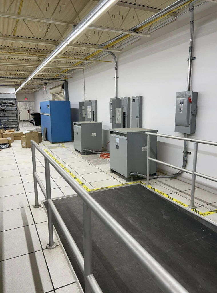 Commercial electrical panels and conduits installed in a data center by Trizone Electric, LLC in Houston, TX.