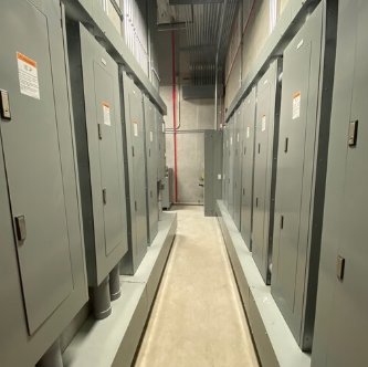 Multiple commercial electrical panels and switchgear installed by Tri-Area Electrical Construction in Cape Coral, FL.