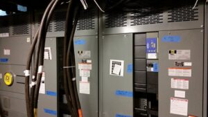 Close-up of commercial electrical panels and heavy-duty wiring installed by Titan Electric in Bellevue, WA.