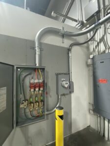 Commercial electrical service upgrade with open panel and meter by Empower Electrical, LLC in Fall River, MA