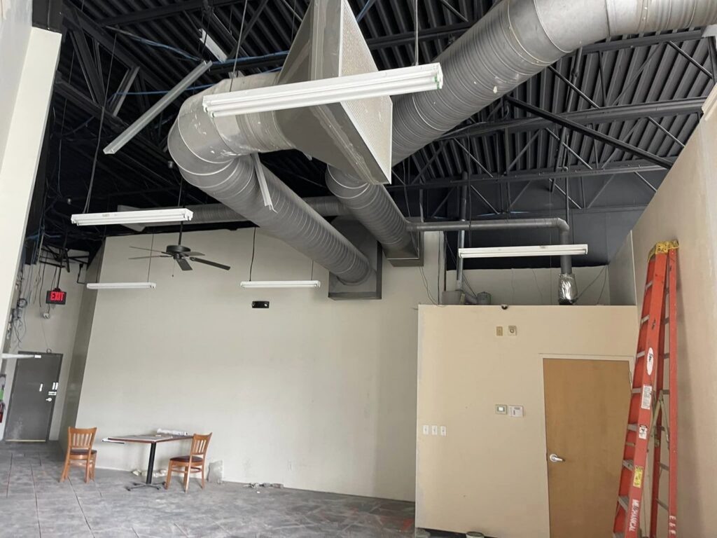 Exposed commercial ductwork installation by Wright Heating and Air in Louisville, KY.
