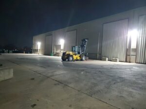 Commercial exterior lighting illuminating a building at night by No Shorts Electrical in Midlothian, TX.